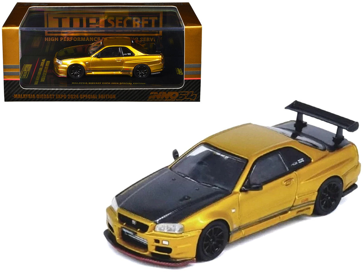 Rapid Vehicles Nissan Skyline GT-R (R34) "Top Secret" RHD (Right Hand Drive) Gold Metallic with...