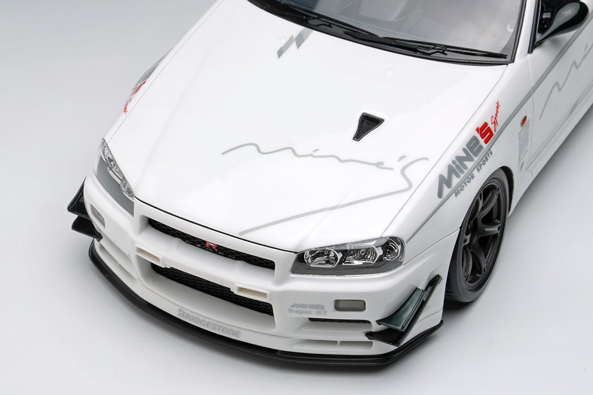 Make Up Co., Ltd / Eidolon Nissan Skyline GT-R (BNR34) V-spec N1 "Mine's" White WITH DISPLAY 1:18