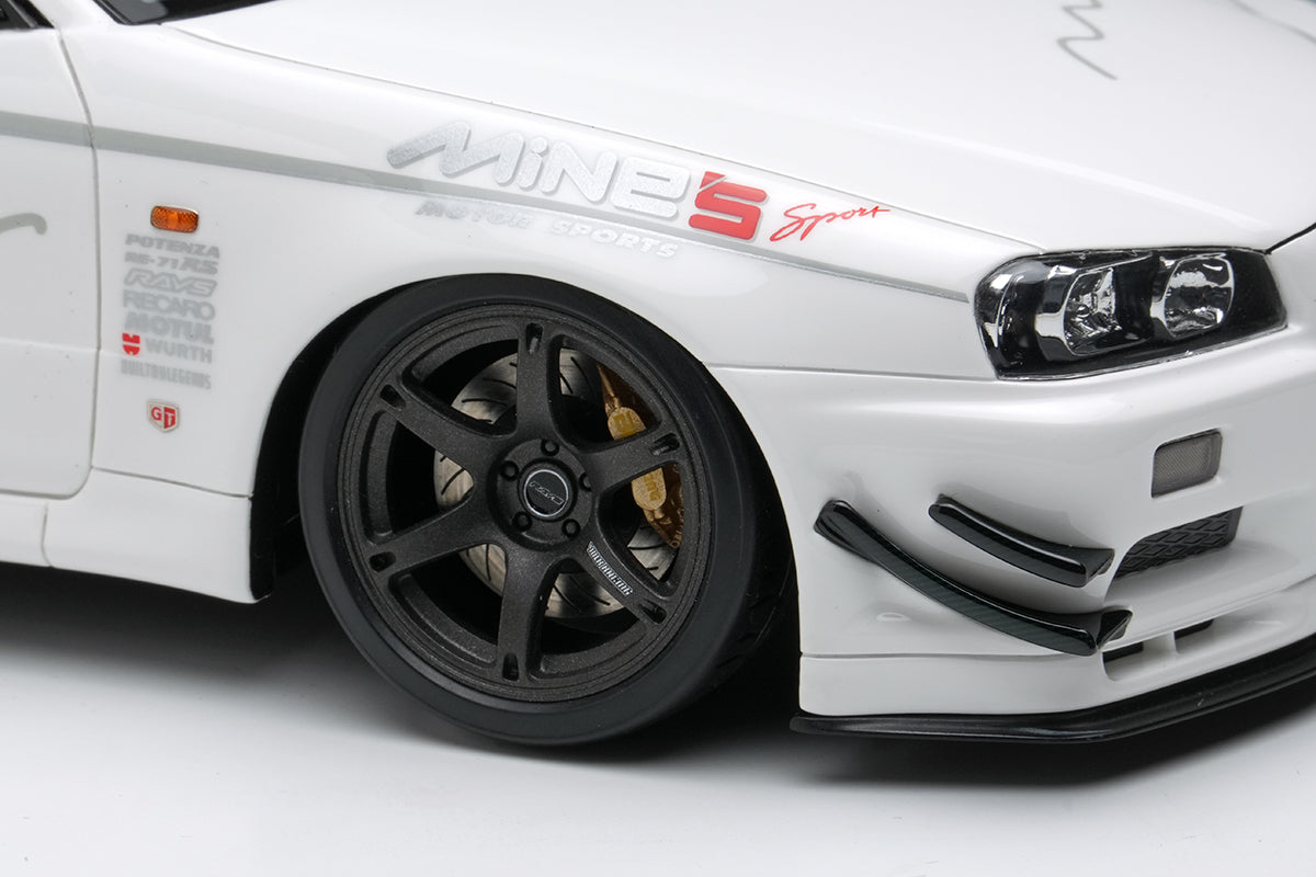 Make Up Co., Ltd / Eidolon Nissan Skyline GT-R (BNR34) V-spec N1 "Mine's" White WITH DISPLAY 1:18