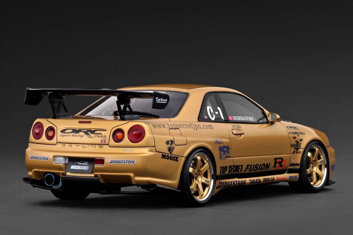 STM Diecast Ignition-Model Nissan Skyline GT-R R34 (BNR34) Top Secret Thailand 34GT-R Gold 1:18 -...