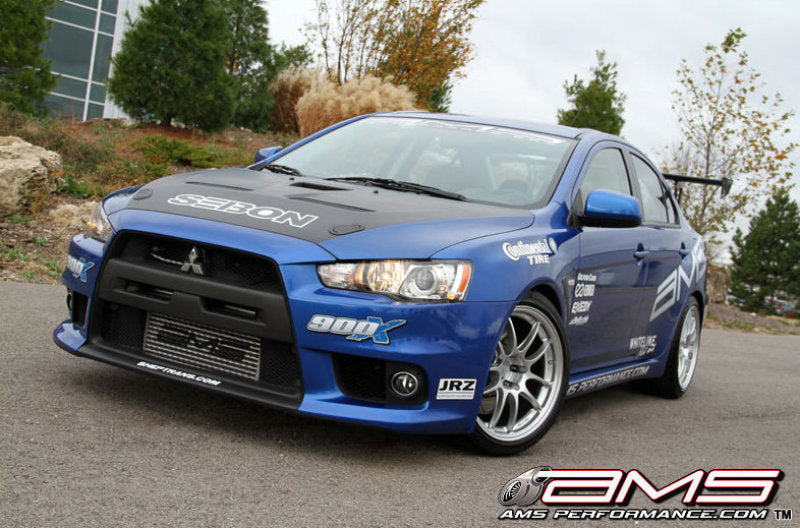 AMS Performance 08-15 Mitsubishi EVO X Front Mount Intercooler w/Modular Cast End Tanks & Logo AMS.04.09.0001-1