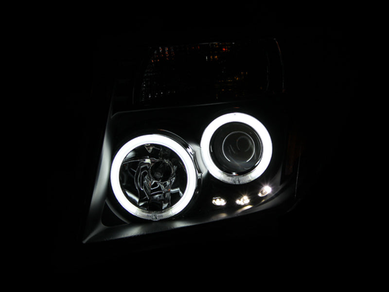 Anzo 2005-2008 Nissan Frontier Projector Headlights w/ Halo Black