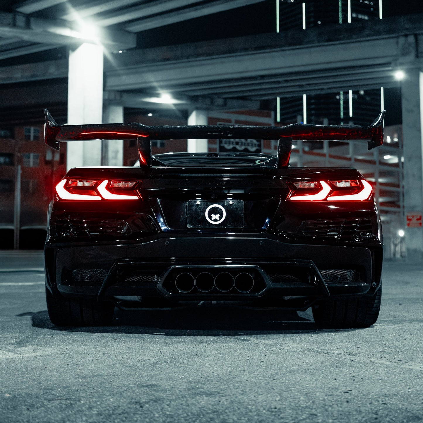 Installed forged carbon C8 aero system high performance rear angle with wing support brackets
