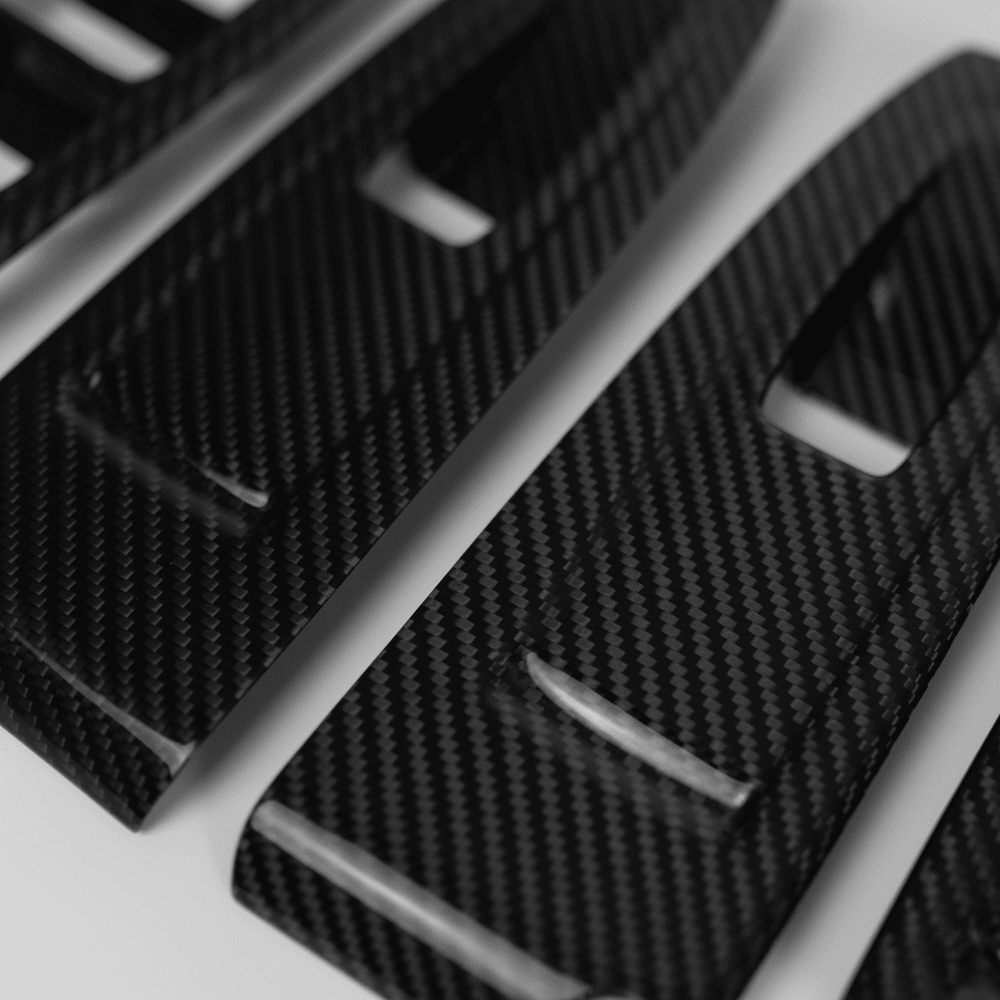 JDMuscle [22-26 WRX] Tanso Pre-preg Carbon Fiber Window Switch Cover with Gloss Finish