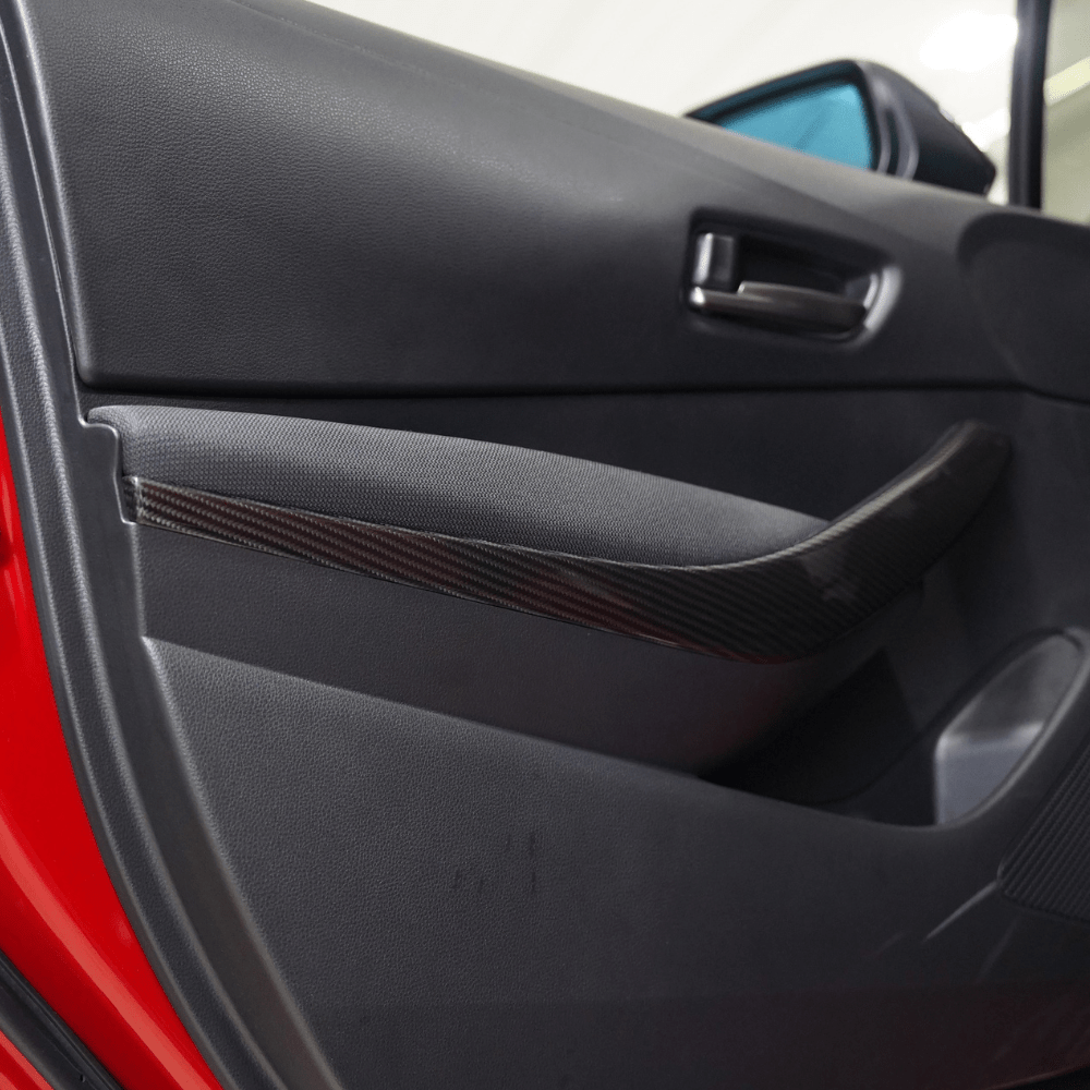 JDMuscle [23-26 GR Corolla] Carbon Fiber Interior Door Handles Covers (Front 2 PCS)