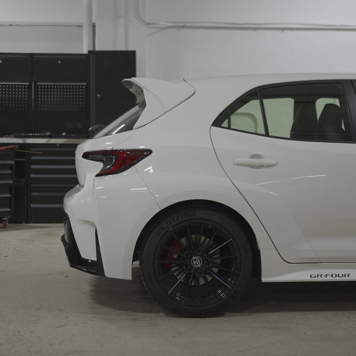 JDMuscle [23-26 GR Corolla, 19-26 Corolla Hatch] Spec C Spoiler - Paint Matched/Gloss Black/Carbon Fiber