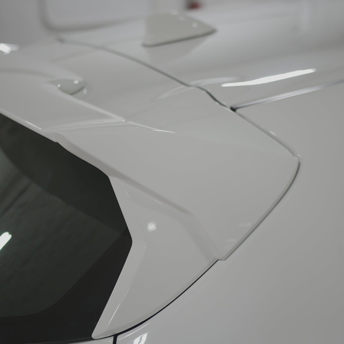 JDMuscle [23-26 GR Corolla, 19-26 Corolla Hatch] Spec C Spoiler - Paint Matched/Gloss Black/Carbon Fiber