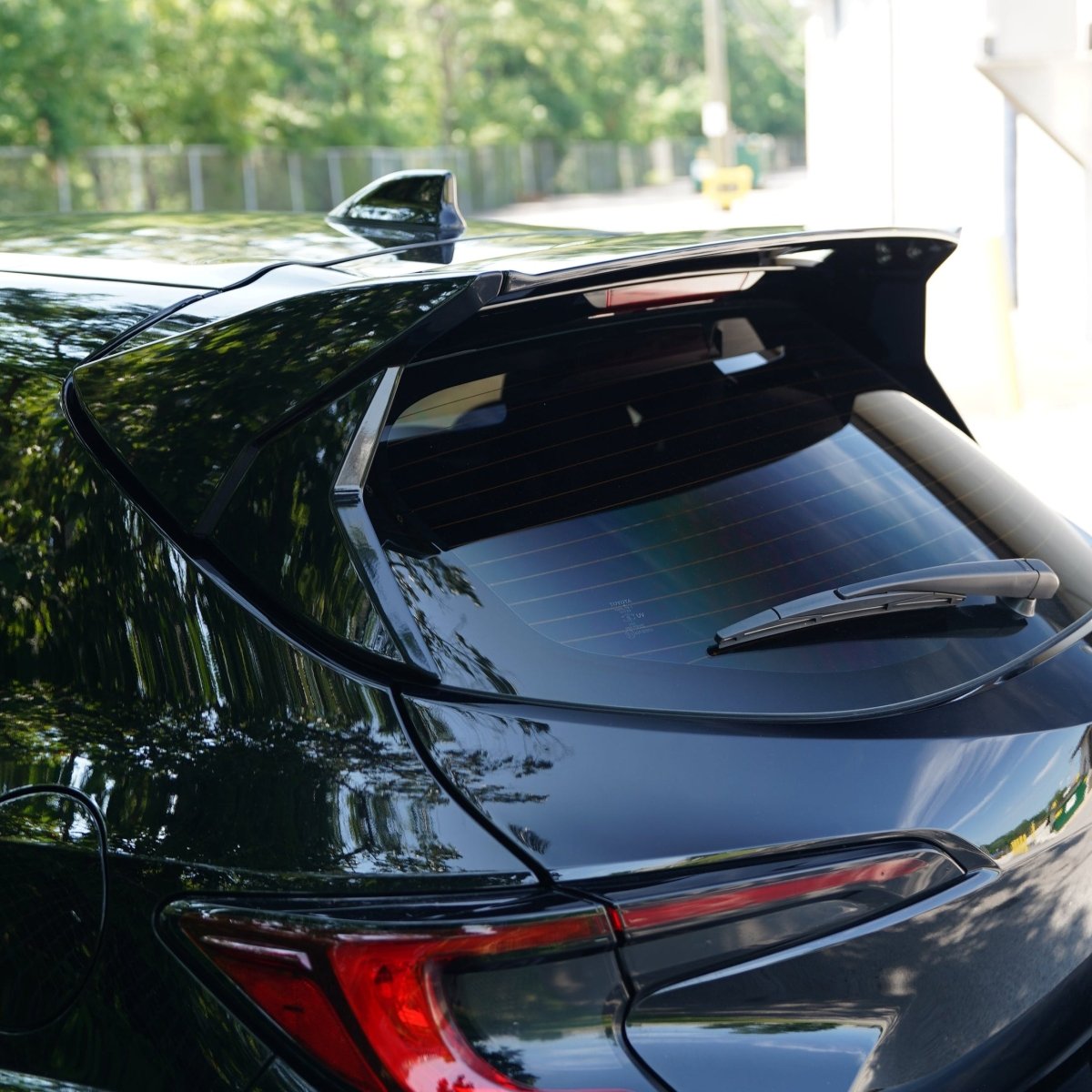 JDMuscle [23-26 GR Corolla, 19-26 Corolla Hatch] Spec C Spoiler - Paint Matched/Gloss Black/Carbon Fiber