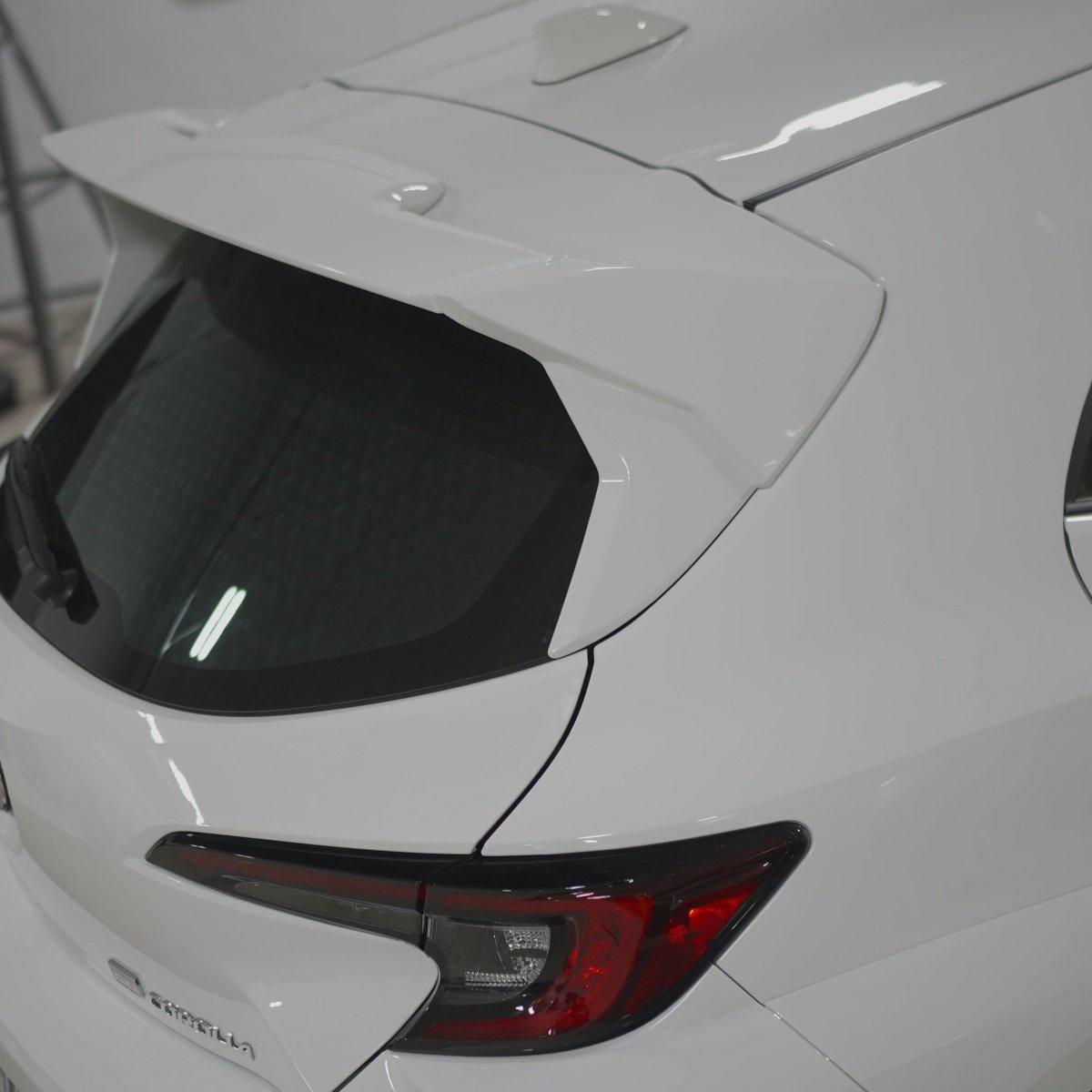 JDMuscle [23-26 GR Corolla, 19-26 Corolla Hatch] Spec C Spoiler - Paint Matched/Gloss Black/Carbon Fiber