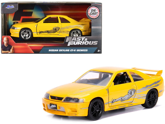 Rapid Vehicles Leon's Nissan Skyline GT-R (BCNR33) Yellow Metallic with Graphics "Fast & Furious"...