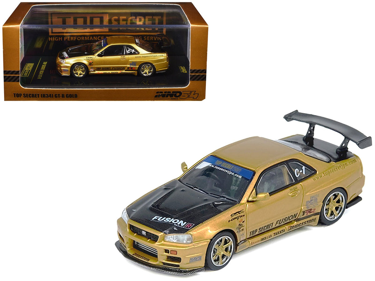 Rapid Vehicles Nissan Skyline GT-R (R34) RHD (Right Hand Drive) "Top Secret" Gold Metallic with...