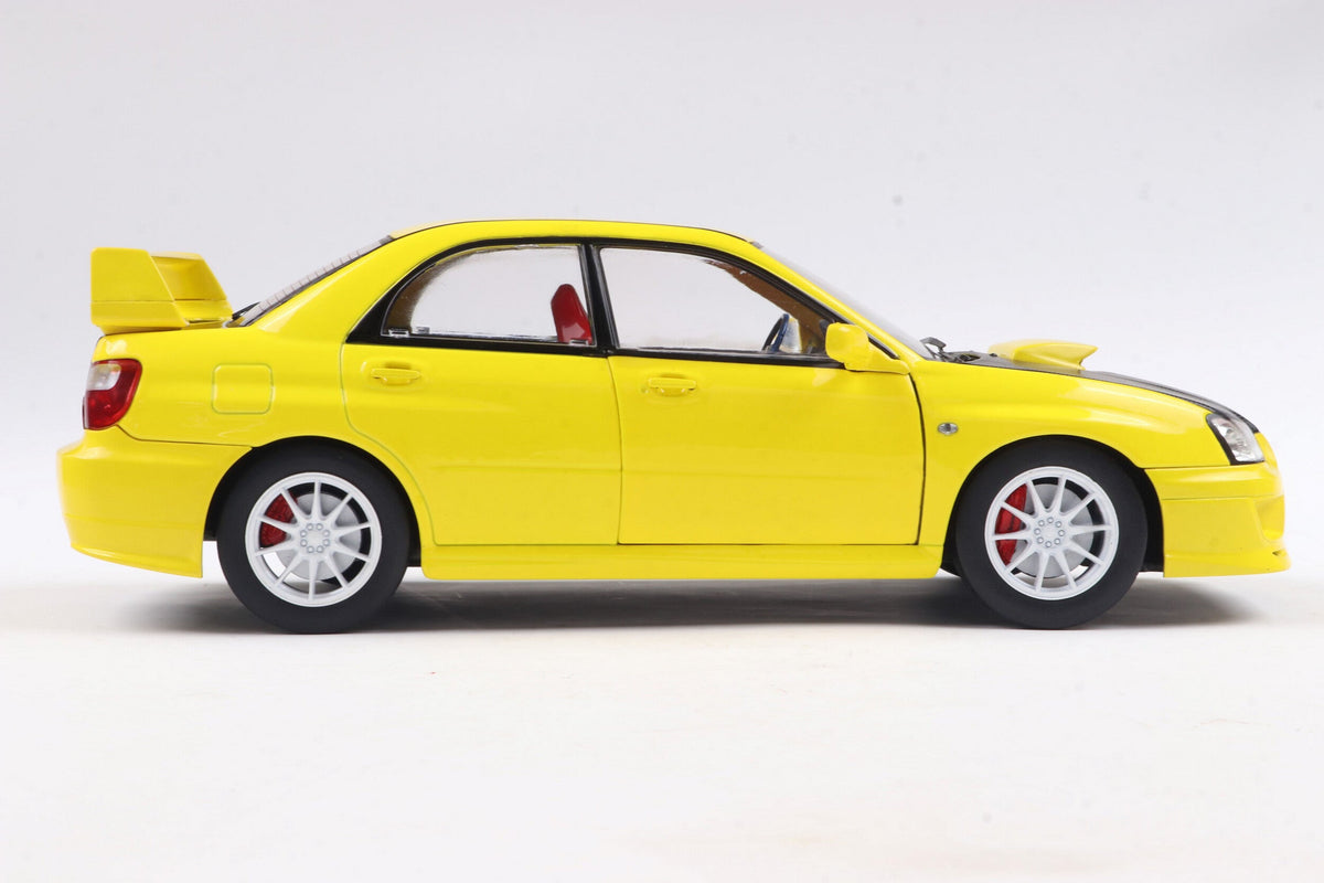 STM Diecast Solido 2003 Subaru WRX STi (GDB) Streetfighter Yellow w/ Black Carbon Hood 1:18 - View 3