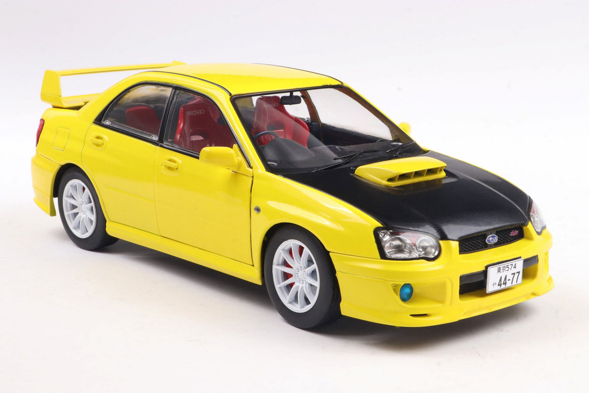 STM Diecast Solido 2003 Subaru WRX STi (GDB) Streetfighter Yellow w/ Black Carbon Hood 1:18 - View 4
