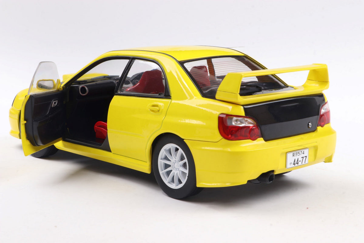 STM Diecast Solido 2003 Subaru WRX STi (GDB) Streetfighter Yellow w/ Black Carbon Hood 1:18 - View 6
